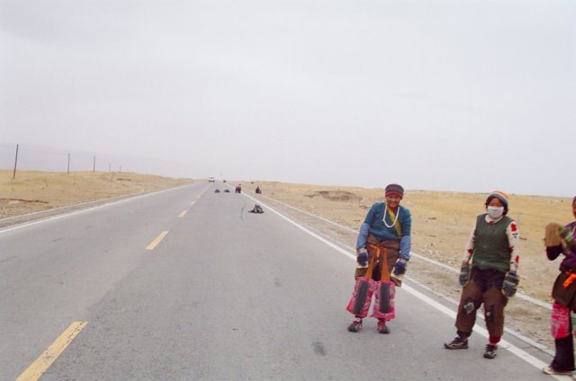 Pilgrims prostrating to Lhasa just under 2000km away.